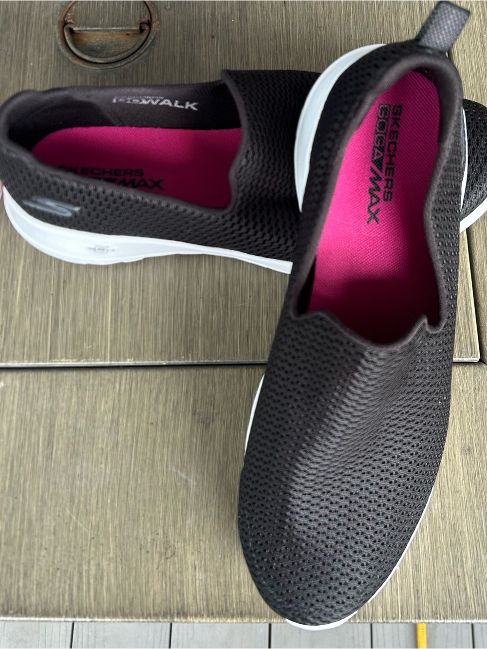 Skechers Slip-On Walking Sneakers in Black with Pink Insole